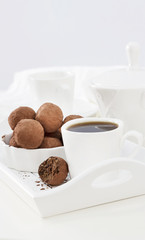 Homemade chocolate vegan truffles. White background. Selective focus.