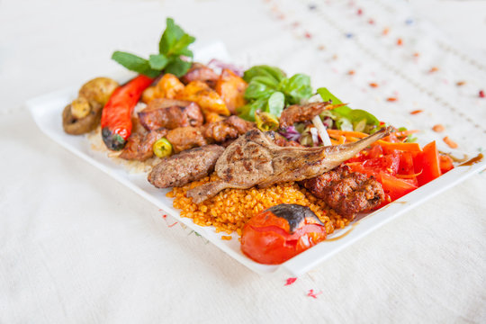 Mixed Grill Plate With Rice And Vegetables