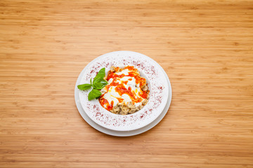 Oriental stuffed manti with sauce