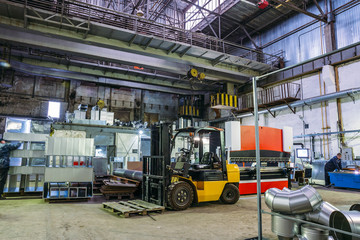 Industrial workshop or hangar on production of ventilation systems. Metalworking factory