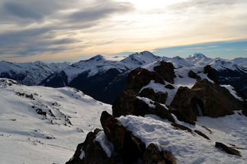 Obraz premium Landscape aerial view of the rocky Mountains full of snow seen from the ski slopes of Whistler, near Vancouver in British Columbia, Canada
