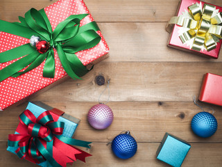 Christmas decorations, giftbox wooden background. Empty space for designer text.top view composition.