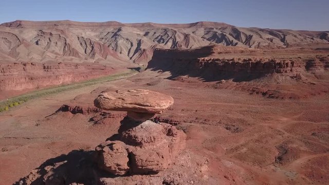 Climbers ascend Mexican Hat formation in Utah