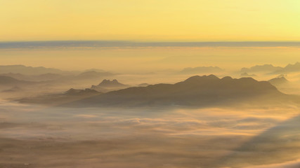 Sea of mist and Sunrise Background.