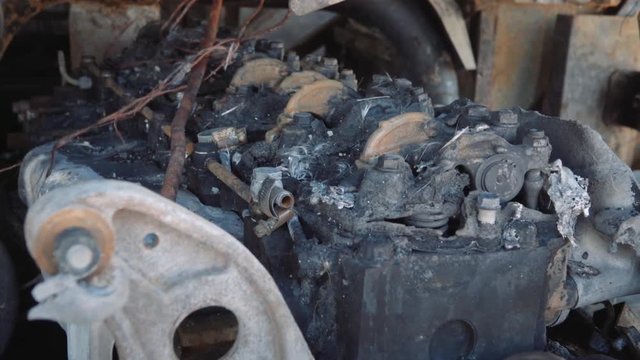 Detail of burnt engine of auto-bus