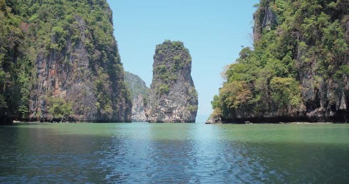 PHUKET, THAILAND, MARCH 2017:  Padling in small boats, through caves and alleys in Phi Phi Islands