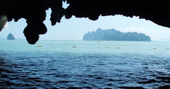 PHUKET, THAILAND, MARCH 2017:  Padling in small boats, through caves and alleys in Phi Phi Islands