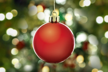 Close-up of decorative balls on Christmas tree background