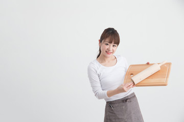 Obraz premium エプロン姿の女性・白バック