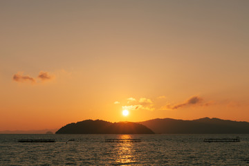 Beautiful sunrise or sunset over tropical sea in phuket thailand.