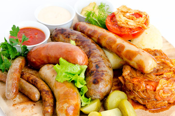 grilled sausages with sauces