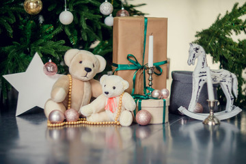 Presents under Christmas Tree in living room. Family Holiday New Year at Home
