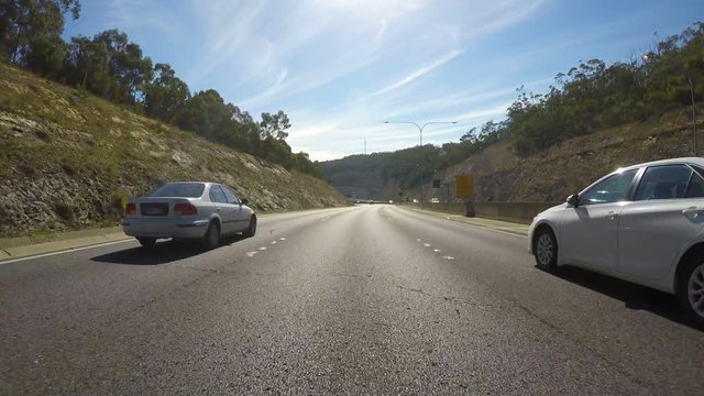 Vehicle POV, driving along freeway from Stirling, Adelaide Hills, to Adelaide, South Australia.