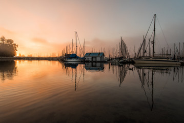 Fototapeta na wymiar Sunrise by the coal harbour marina vancouver canada