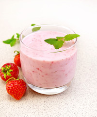 Milkshake strawberry on stone table