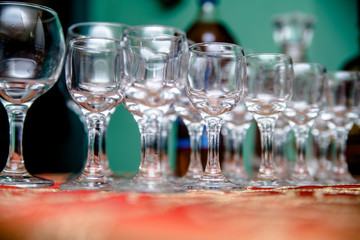 Glass glasses stand on a buffet table