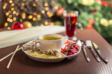 Christmas business lunch on the background of holiday decorations