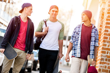 Teenage friends walking at the street