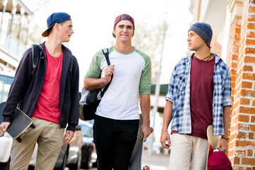 Teenage friends walking at the street