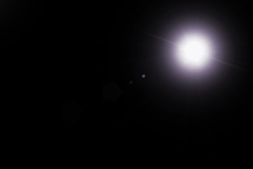 digital lens flare,sun burst on black background
