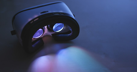 Virtual reality device playing film inside at night