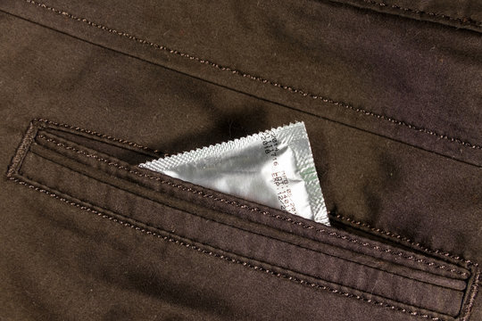 Condom in back pocket of brown pants