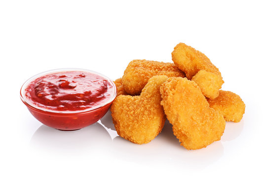 Chicken nuggets and ketchup isolated on white background.