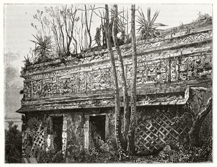 Ruins of an ancient Maya temple stone roof and vegetation growing on it. The Nunnery Mayan edifice in Chichen-Itza,Yucatan Mexico. By Guaiaud published on Le Tour du Monde Paris 1862