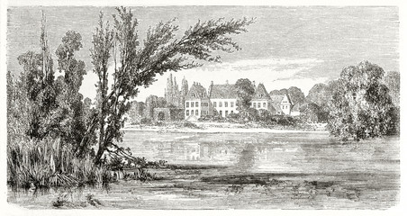 Ancient european landscape with a large pond, his vegetation and a castle surrounded by bushes on background. Lykkesholm castle Denmark. Created by Therond published on Le Tour du Monde Paris 1862