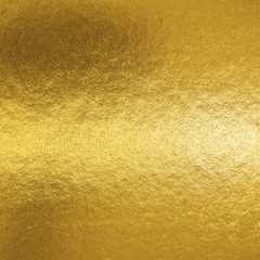 Gold foil leaf shiny metallic wrapping paper texture background for wall paper decoration element