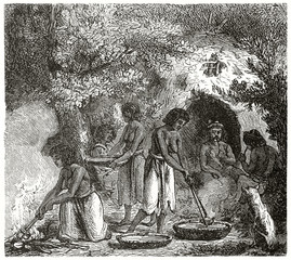 Ancient native americans cooking and smoking in the deep forest wearing their semi naked costumes. Created by Chassevent after previous gravure by unknown author on Le Tour du Monde Paris 1862