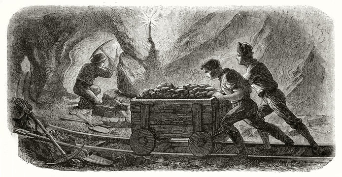 Ancient miners pulling a cart on a rail in a quartz mine at the soft light of a candle while another one is working with a pickaxe. By Chassevent and Sargent published on Le Tour du Monde Paris 1862