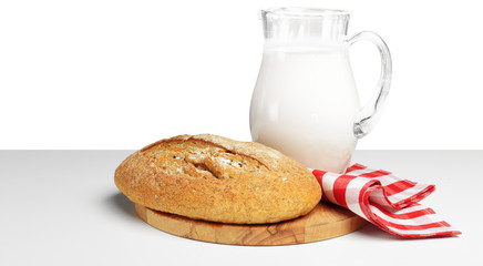 Bread and milk on the table