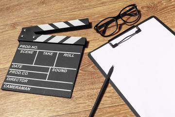 Film clapper board on a table