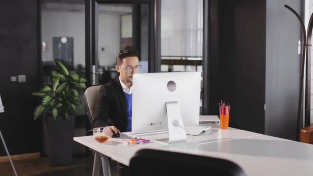 Man type on keyboard in the modern office