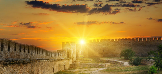 Sun rise over the fortress wall of a medieval fortress. Akkerman Ukraine.