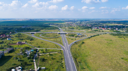 Fototapeta na wymiar Landscape road and field view from above