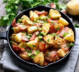 Fried potato in frying pan