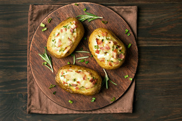 Stuffed potatoes with bacon, green onion and cheese