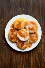 Curd cheese pancakes with caramelized apple slices