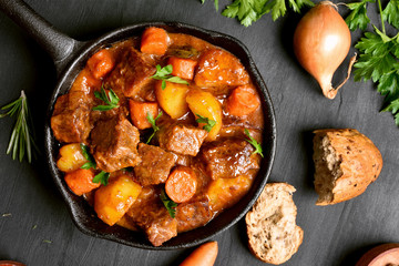 Tasty goulash, beef stew in cast iron pan