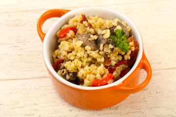 Bulgur with chicken hearts