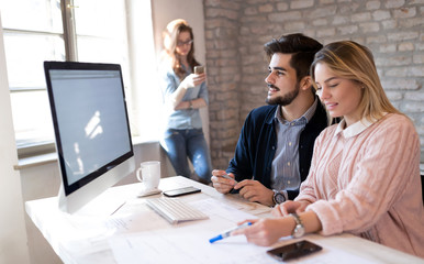 Coworking process, designers team working in modern office