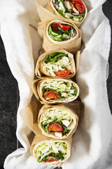 Fresh tortilla wraps with vegetables and chicken. Gourmet conception.