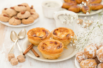 traditional portuguese dessert on white plate pastel de nata