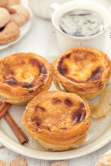 traditional portuguese dessert on white plate pastel de nata