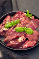 raw chicken liver with black pepper