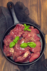 raw chicken liver with black pepper