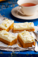 Pumpkin Bars with cream cheese fristing.