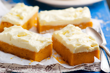 Pumpkin Bars with cream cheese fristing.